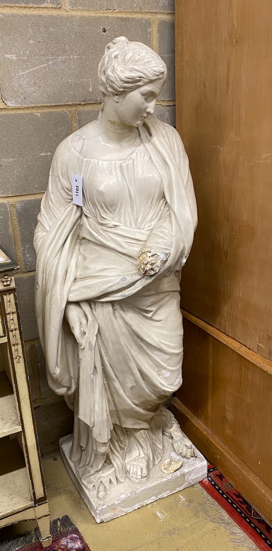 After the antique. A painted plaster figure of a classical woman (a.f.), height 127cm